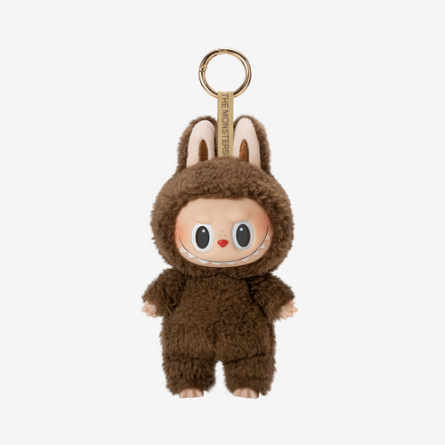 Labubu Chestnut Cocoa keychain plush from the "Exciting Macarons" series, featuring a dark brown fuzzy bunny costume with upright ears and a wide, toothy grin