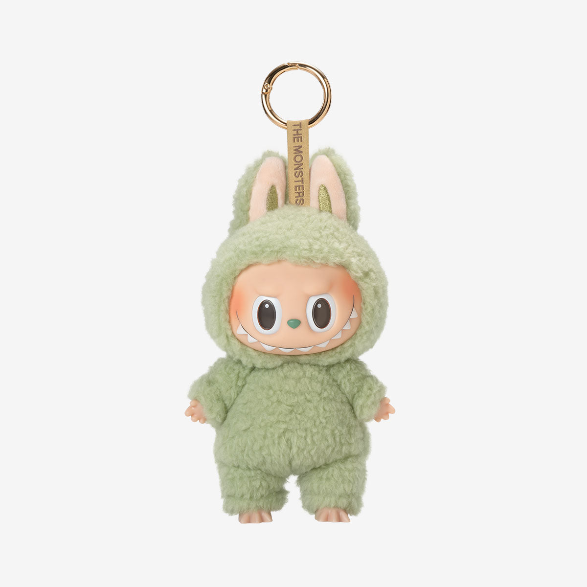 Labubu Green Grape keychain plush from the "Exciting Macarons" series, featuring a dark brown fuzzy bunny costume with upright ears and a wide, toothy grin