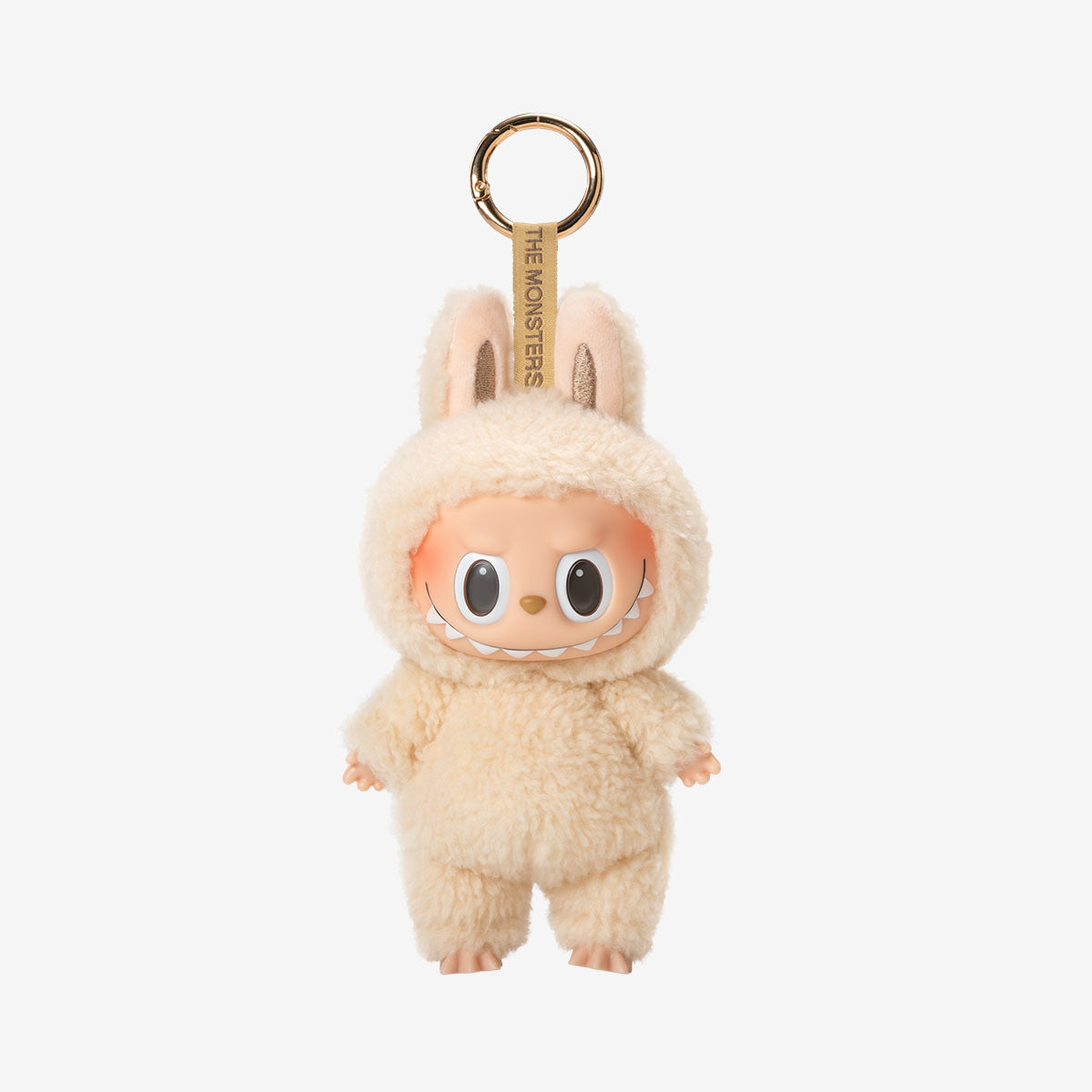 Labubu Soymilk keychain plush from the "Exciting Macarons" series, featuring a dark brown fuzzy bunny costume with upright ears and a wide, toothy grin