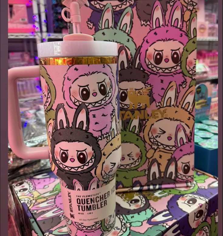 colorful labubu water tumbler front view imahe with box behind