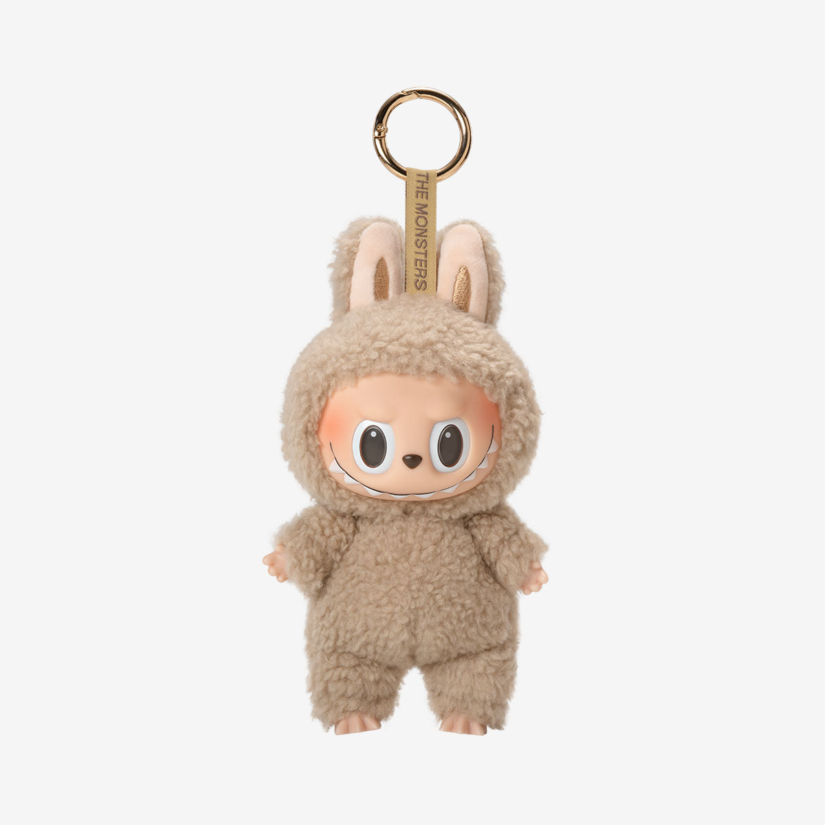 Labubu Toffee keychain plush from the "Exciting Macarons" series, featuring a dark brown fuzzy bunny costume with upright ears and a wide, toothy grin