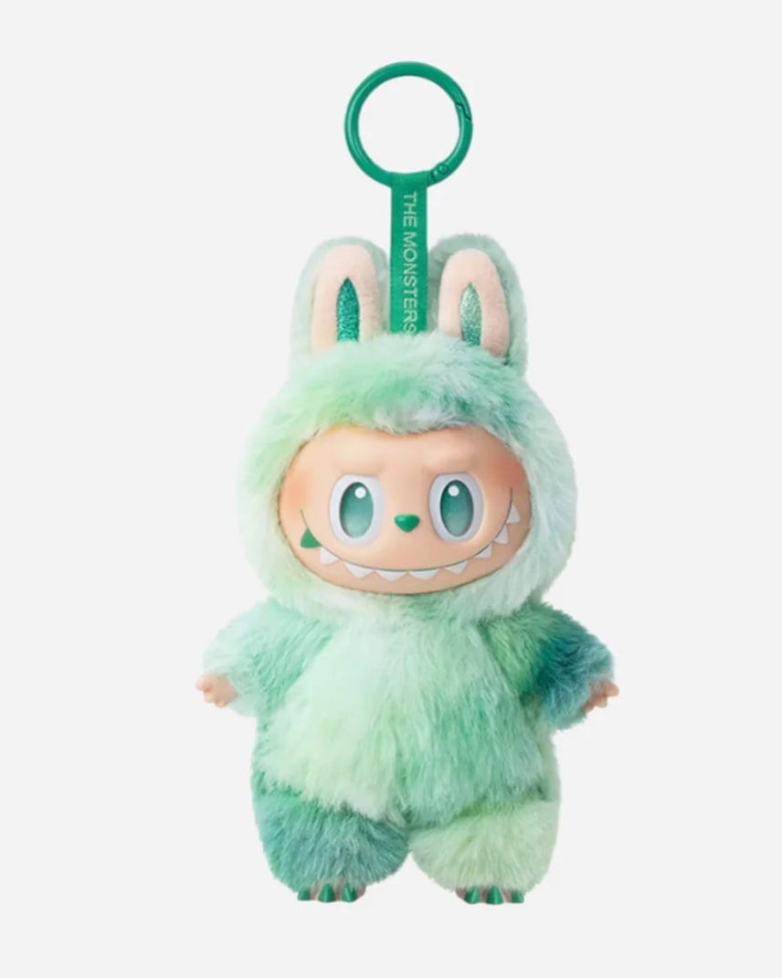 Labubu “Serenit” plush keychain from the Big Into Energy series, featuring a soft mint-green-colored furry bunny suit, playful wide grin with visible teeth, and matching keyring tag.